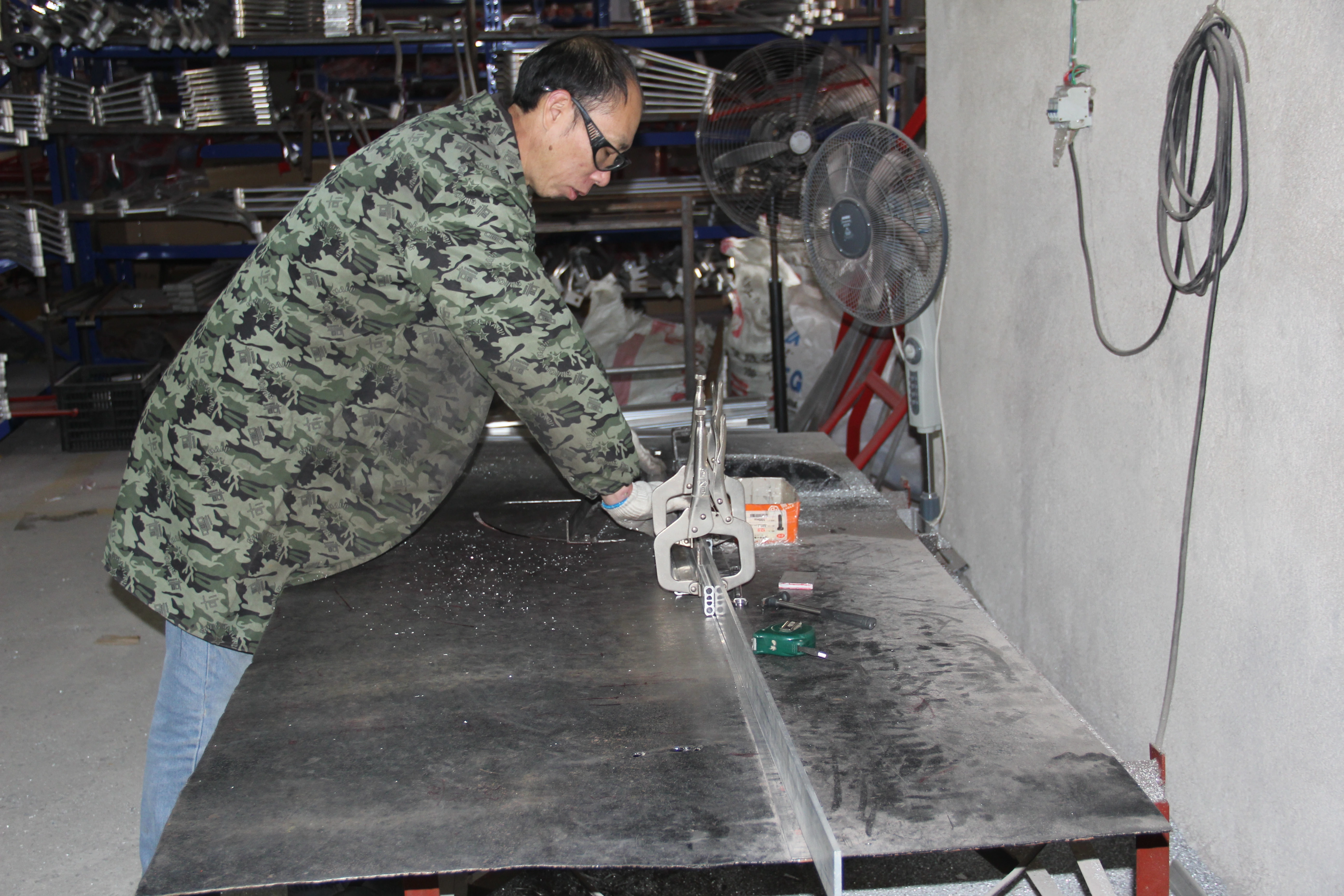 Factory production work for automotive suspension parts
